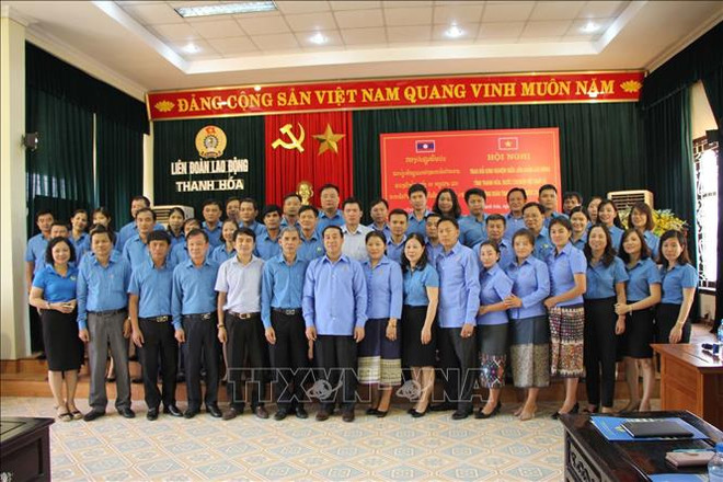 越南清化省与老挝华潘省就工会活动举行经验交流会 ảnh 2 越南清化省与老挝华潘省就工会活动举行经验交流会 ảnh 2
