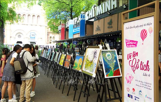 儿童通过爱心绘画活动创造生活奇迹 ảnh 1