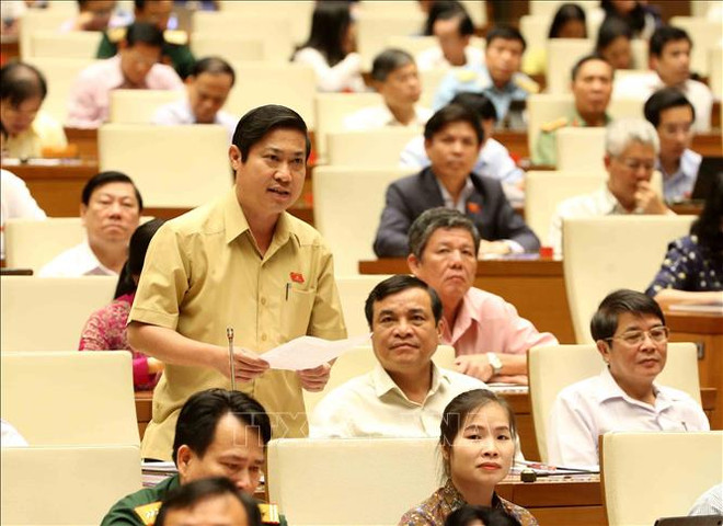 越南第十四届国会第七次会议公报(第十二号) ảnh 1 越南第十四届国会第七次会议公报(第十二号) ảnh 1