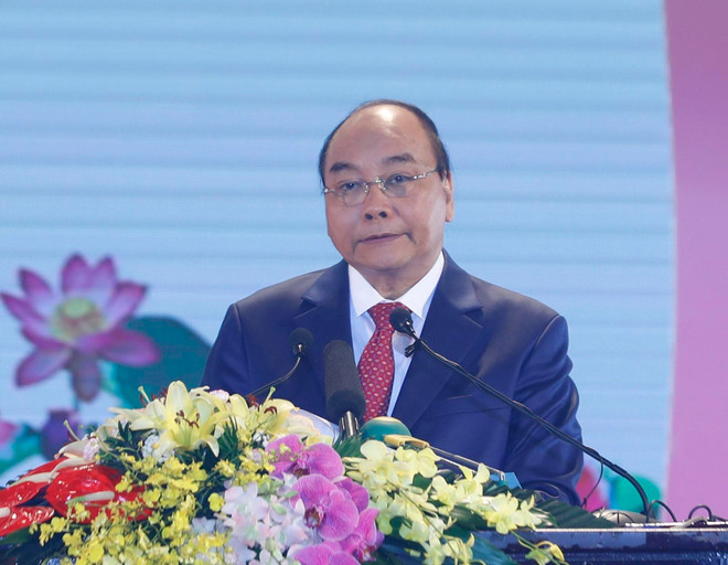 阮春福启动“2021-2025年全国携手推进新农村建设”竞赛活动 ảnh 1