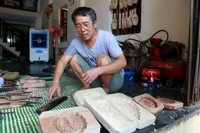 河内市常信县历史悠久的传统月饼模制作村 ảnh 2