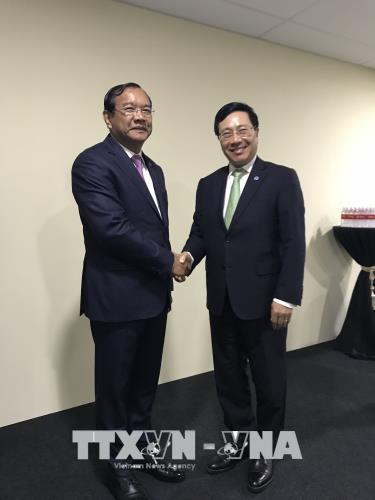 第51届东盟外长会议： 范平明分别会见柬埔寨和挪威外交大臣 ảnh 1