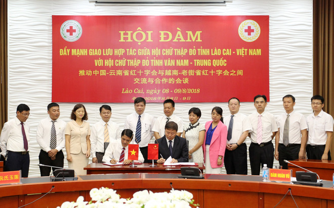 越南老街省与中国云南省建立友好合作关系架起人道领域桥梁 ảnh 1