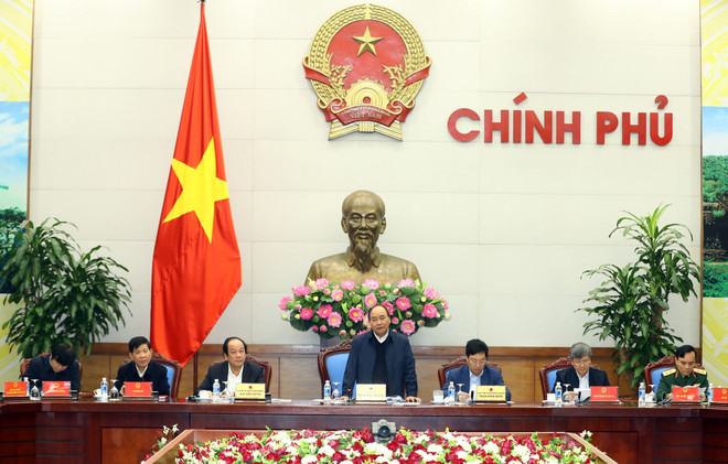 政府总理阮春福主持召开越老合作委员会会议 ảnh 2