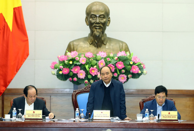 政府总理阮春福主持召开越老合作委员会会议 ảnh 1