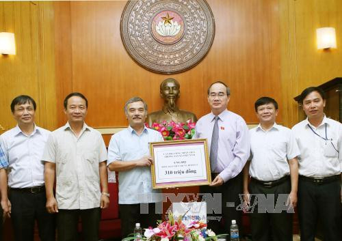 越南通讯社捐款帮助中部灾区灾民 ảnh 1 越南通讯社捐款帮助中部灾区灾民 ảnh 1