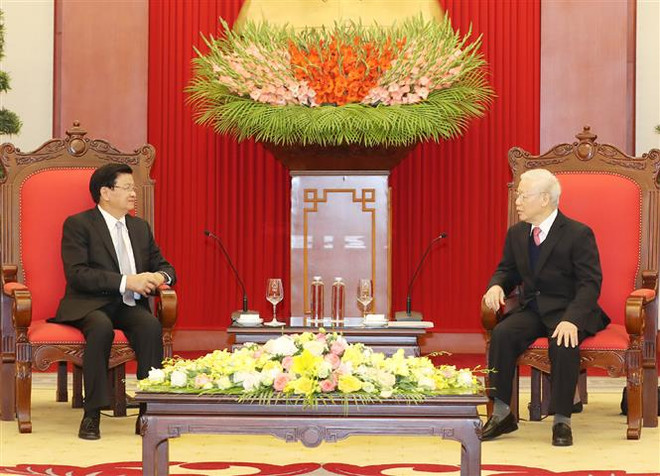 组图：越共中央总书记、国家主席阮富仲接见老挝政府总理通伦•西苏里 ảnh 3