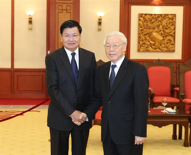 越共中央总书记阮富仲会见老挝政府总理通伦•西苏里 ảnh 2 越共中央总书记阮富仲会见老挝政府总理通伦•西苏里 ảnh 2