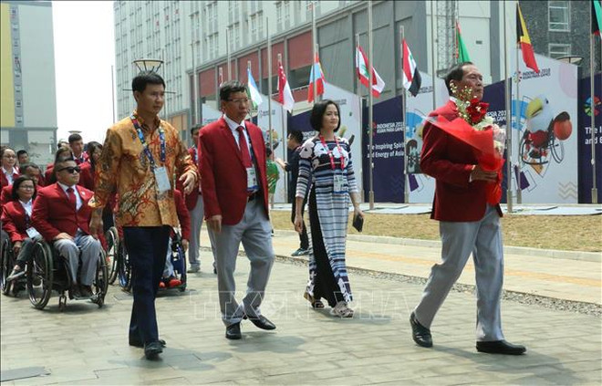2018年第三届亚残会:越南体育代表团在雅加达举行升旗仪式 ảnh 2 2018年第三届亚残会:越南体育代表团在雅加达举行升旗仪式 ảnh 2