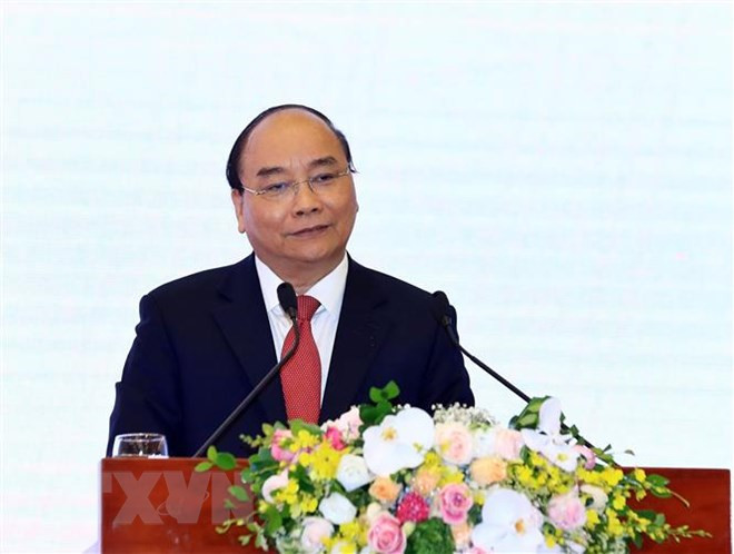 日本媒体刊登越南政府阮春福接受记者采访的文章 ảnh 1