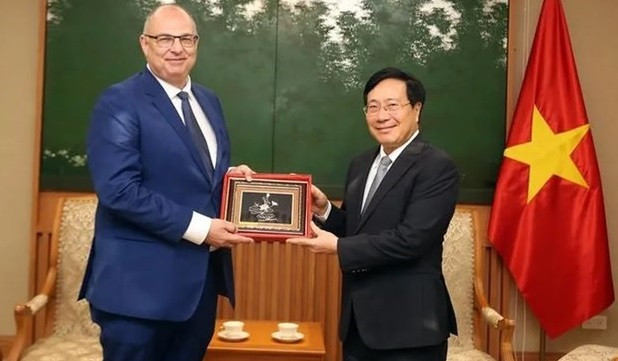 越南政府常务副总理范平明会见丹麦大使 ảnh 1 越南政府常务副总理范平明会见丹麦大使 ảnh 1