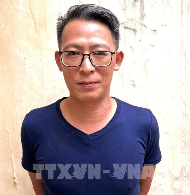 一人涉嫌传播含有破坏国家信息罪被捕 ảnh 1