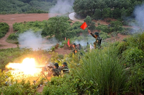 党领导革新开放事业35周年：加强国防 坚决捍卫祖国（第三期） ảnh 1