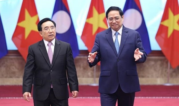 越老关系60周年:两国关系蒸蒸日上 为两国人民带来切实利益 ảnh 1 越老关系60周年:两国关系蒸蒸日上 为两国人民带来切实利益 ảnh 1