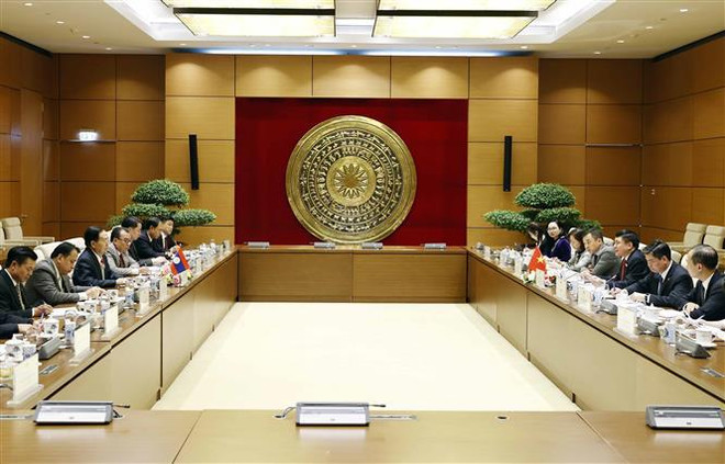 越南与老挝密切配合制定两国议会关系文件 ảnh 1 越南与老挝密切配合制定两国议会关系文件 ảnh 1