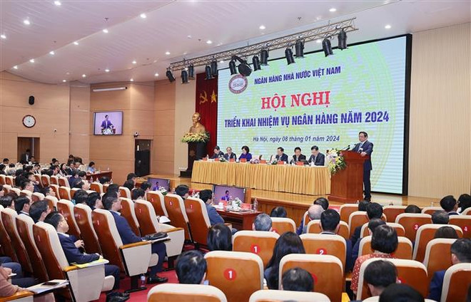 越南政府总理范明政:银行业要发挥好经济命脉作用 ảnh 1 越南政府总理范明政:银行业要发挥好经济命脉作用 ảnh 1