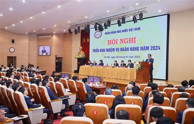 越南政府总理范明政：银行业要发挥好经济命脉作用 ảnh 1