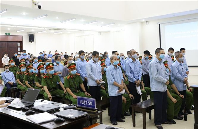 河内市美德县同心乡谋杀和妨碍公务案:29名作案人出庭受审 ảnh 1 河内市美德县同心乡谋杀和妨碍公务案:29名作案人出庭受审 ảnh 1