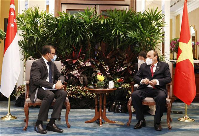 越南国家主席阮春福会见新加坡金融、能源企业领导 ảnh 6 越南国家主席阮春福会见新加坡金融、能源企业领导 ảnh 6