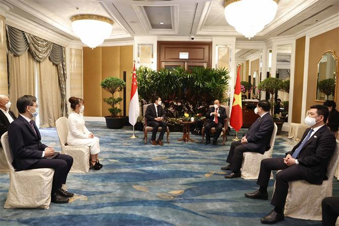 越南国家主席阮春福会见新加坡金融、能源企业领导 ảnh 7 越南国家主席阮春福会见新加坡金融、能源企业领导 ảnh 7