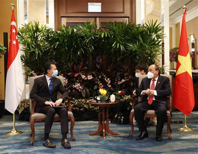 越南国家主席阮春福会见新加坡金融、能源企业领导 ảnh 5 越南国家主席阮春福会见新加坡金融、能源企业领导 ảnh 5
