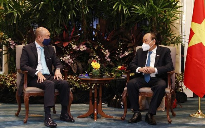 越南国家主席阮春福会见新加坡金融、能源企业领导 ảnh 1 越南国家主席阮春福会见新加坡金融、能源企业领导 ảnh 1