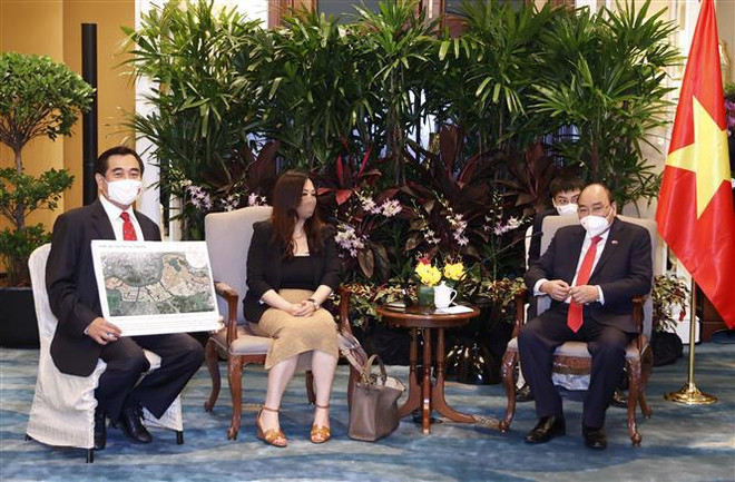 越南国家主席阮春福会见新加坡多家领先集团领导人 ảnh 3  越南国家主席阮春福会见新加坡多家领先集团领导人 ảnh 3