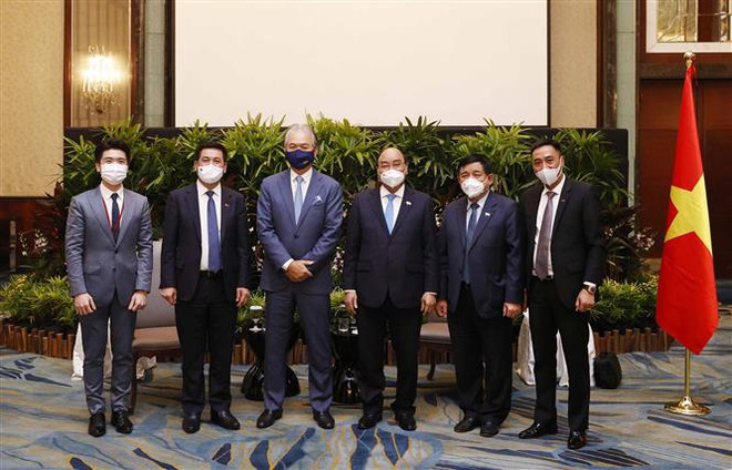 越南国家主席阮春福会见新加坡一流创新企业领导 ảnh 2 越南国家主席阮春福会见新加坡一流创新企业领导 ảnh 2