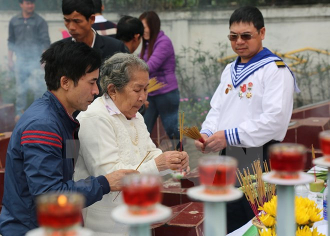 越南广平省缅怀鬼鹿角礁海战中英勇牺牲的64位海军战士 ảnh 1