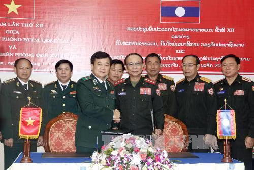 越老加强协作配合 共同维护边界的和平与安全 ảnh 1