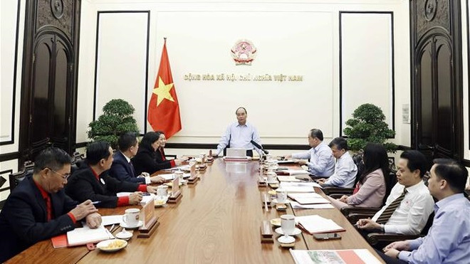 国家主席阮春福:动员各种资源 保障困难群众过好年 ảnh 1  国家主席阮春福:动员各种资源 保障困难群众过好年 ảnh 1