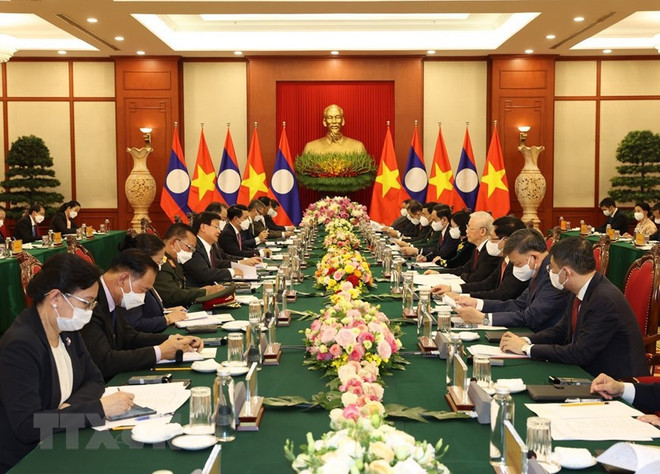 老挝领导访越之旅是两个民族的新历史里程碑 ảnh 2 老挝领导访越之旅是两个民族的新历史里程碑 ảnh 2
