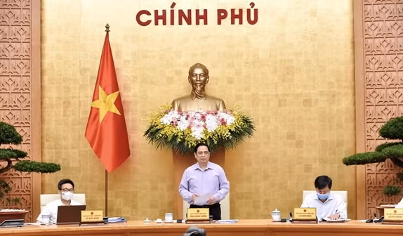 范明政总理：完善受疫情影响劳动者和企业扶持政策 努力做到全覆盖、不遗漏 ảnh 1