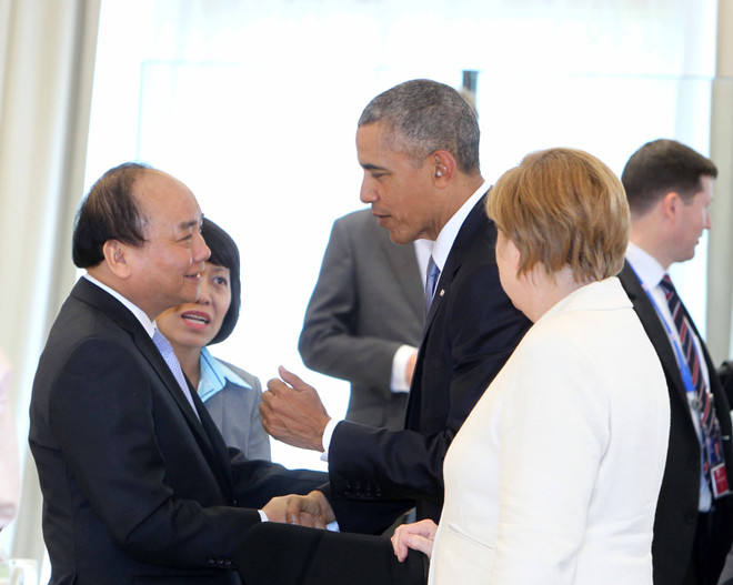 越南政府总理阮春福七国集团峰会期间与各国元首举行双边会晤 ảnh 5 越南政府总理阮春福七国集团峰会期间与各国元首举行双边会晤 ảnh 5