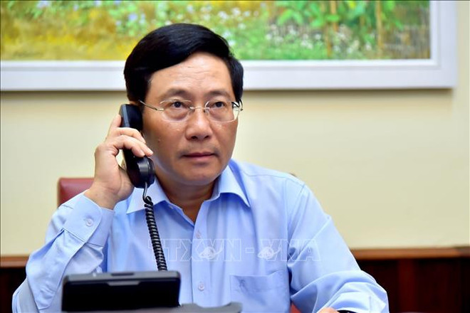 越南政府副总理兼外长范平明与加拿大外长进行电话会谈 ảnh 1 越南政府副总理兼外长范平明与加拿大外长进行电话会谈 ảnh 1