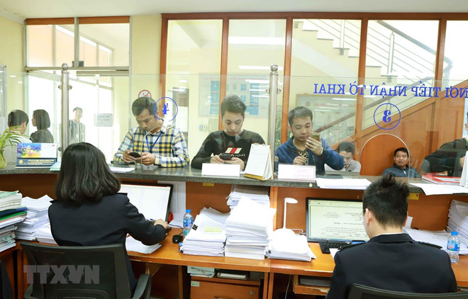 行政改革工作为人民、组织和企业在生产经营活动和日常生活带来许多利益 ảnh 1