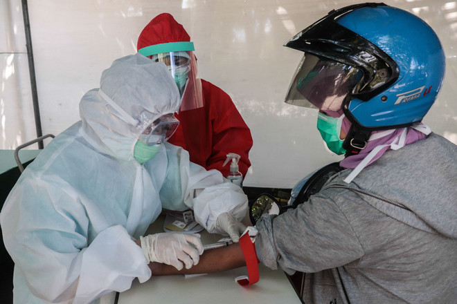 新冠肺炎疫情：印尼和菲律宾单日新增确诊病例达数百例 ảnh 1