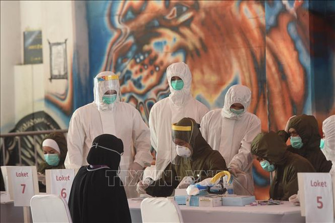 新冠肺炎疫情：印尼新增确诊病例创下单日最大增幅 累计确诊13645例 ảnh 1