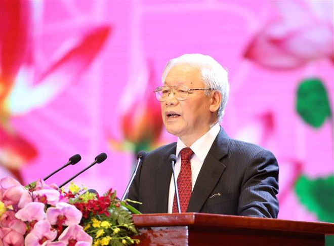 胡志明主席诞辰130周年纪念大会在河内隆重举行 ảnh 4