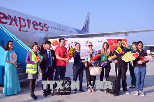 新春伊始岘港和老街喜迎第一名游客 ảnh 1 新春伊始岘港和老街喜迎第一名游客 ảnh 1