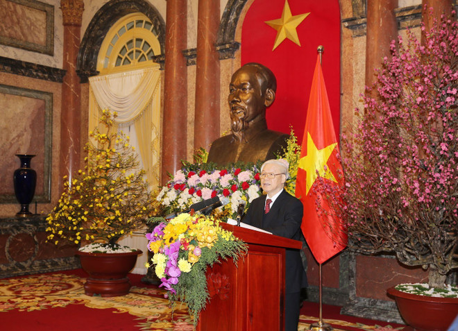 越共中央总书记阮富仲向党、国家领导、全国同胞和战士拜年 ảnh 1