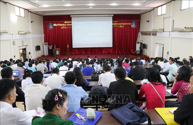越南与老挝加强合作 提高教育培训质量 ảnh 1
