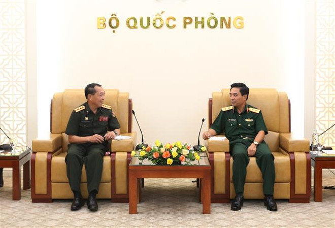 越南与老挝国防部重视开展通信联络合作关系 ảnh 1
