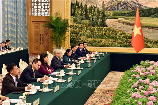 越南祖国阵线中央委员会主席杜文战与中国全国政协主席王沪宁举行会谈 ảnh 2