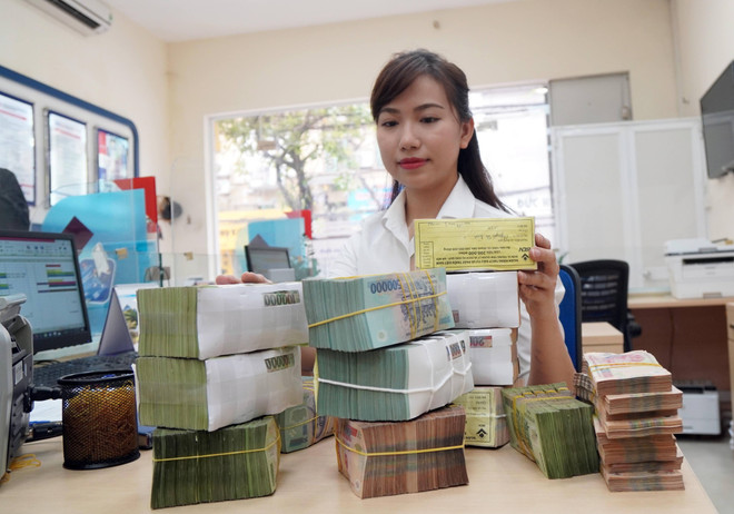 7月25日上午越南国内市场越盾对美元汇率中间价上调7越盾 ảnh 1 7月25日上午越南国内市场越盾对美元汇率中间价上调7越盾 ảnh 1