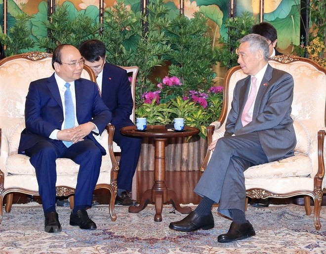 越南与新加坡发表联合声明 ảnh 1 越南与新加坡发表联合声明 ảnh 1
