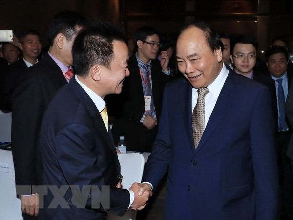 阮春福出席越南与新加坡商务论坛 ảnh 1 阮春福出席越南与新加坡商务论坛 ảnh 1