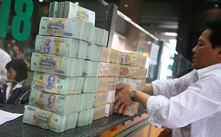 越南国家银行自3月17日起下调基准利率 ảnh 1