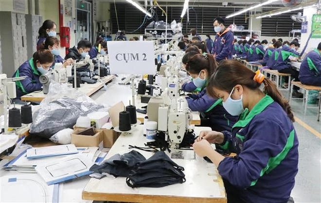 新冠肺炎疫情:越南有能力满足人民对防疫口罩需求 ảnh 1 新冠肺炎疫情:越南有能力满足人民对防疫口罩需求 ảnh 1