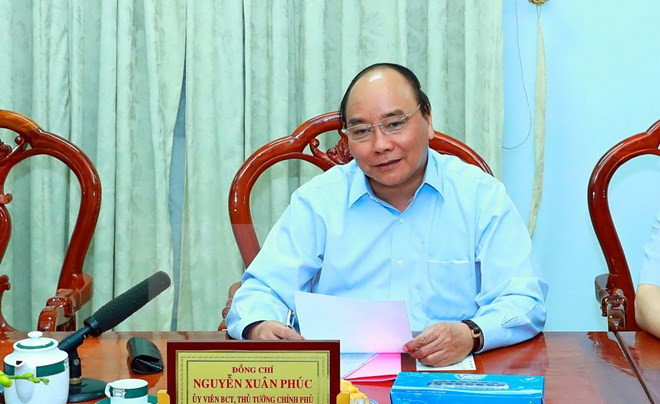 阮春福总理：安江省应关注提高出口粮食质量与附加值 ảnh 1